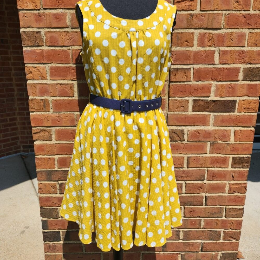 Tulip brand Sun dress with yellow color, blue belt and white dots.